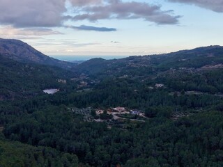 Fototapeta premium Serene landscape vista, Tranquil aerial perspective showcasing lush valleys and rolling hills
