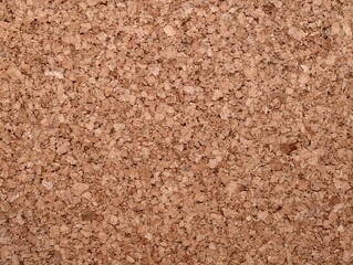 Sustainable earth toned cork surface with textured granules ideal for interior projects and crafts