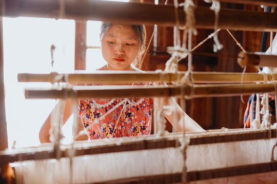 Artisan Weaving with a Traditional Loom