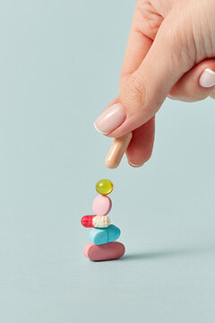 Stack of pills and capsules getting assembled in vertical stack