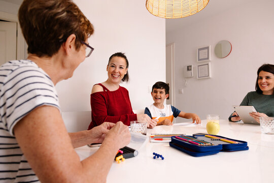 Multi-generational family enjoying time together indoors