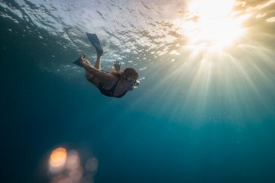 Woman Diving Snorkeling in Caribbean at Norman Island BVI