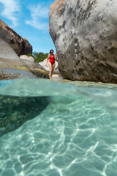 Woman at Devils Bay the Baths Virgin Gorda BVI Caribbean