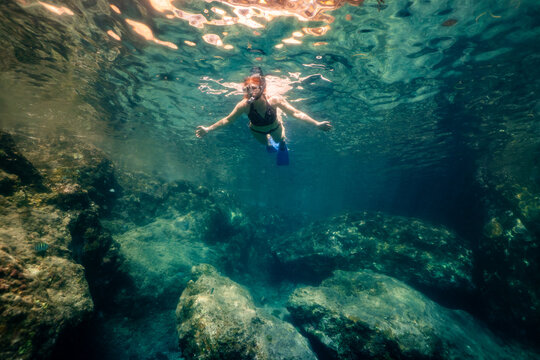 Woman Snorkeling on Caribbean Vacation at Norman Island BVI