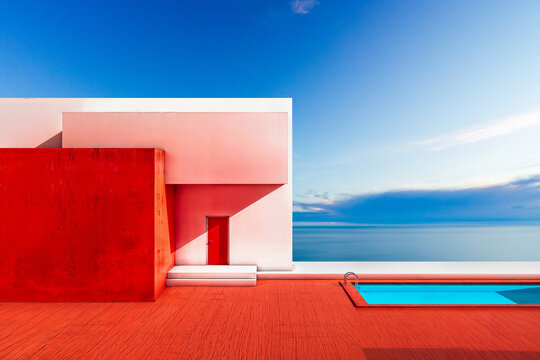 Modern seafront house with pool at dusk