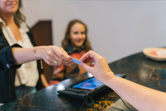 Hotel Check-in at Reception Desk