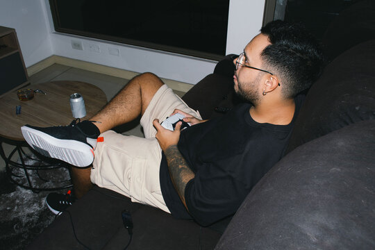 Young man playing video games