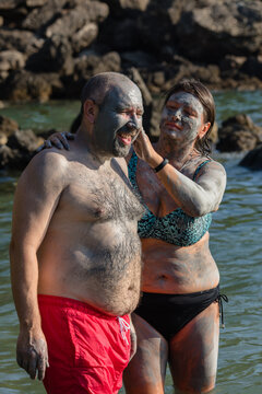 Spouses at the natural blue clay source
