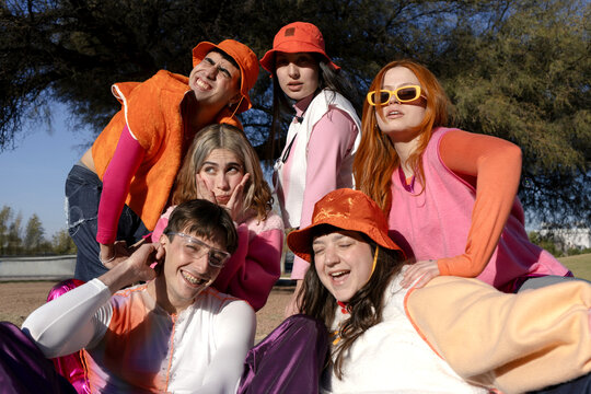 Group of happy best friends with alternative fashion look 