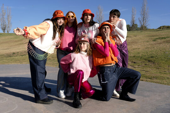 Group of happy best friends with alternative fashion look 