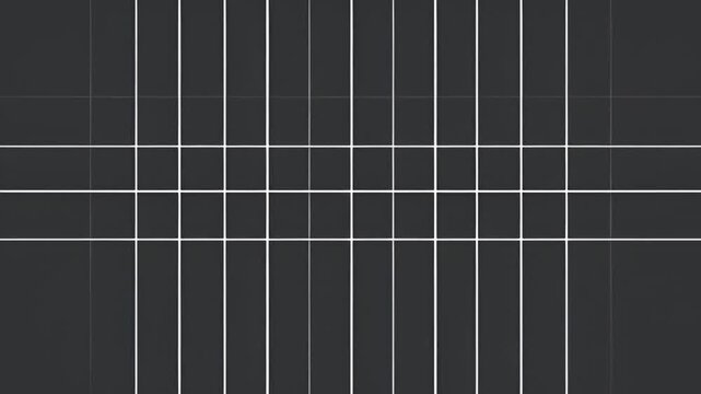 Abstract geometric pattern featuring a grid of dark gray tiles with white lines