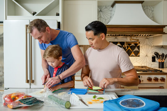Dad Teaches Son To Cut Vegetables