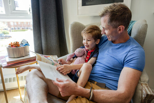 Father Reads To His Son