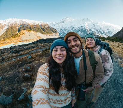 Selfie of friends hiking Hooker Valley Track in New Zealand