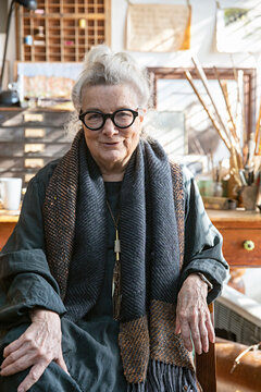 Portrait of a mature creative woman at her desk 