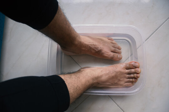 Man Doing Pedicure at Home