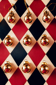 Christmas balls with santa claus reflection on colored background 