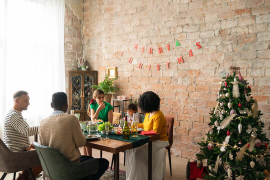 People celebrating Christmas at home