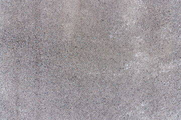 細かい砂利が密集した壁のテクスチャ（洗い出し仕上げ）