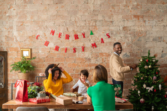Many people preparing for Christmas at home