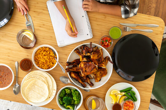 Family Dinner with Chicken and Homework