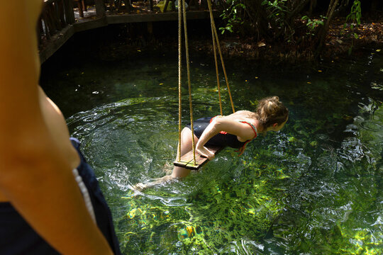 Woman standing in Cenote