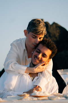 Two Men Hugging Each Other