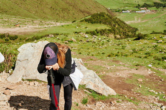 Blonde young woman trekking