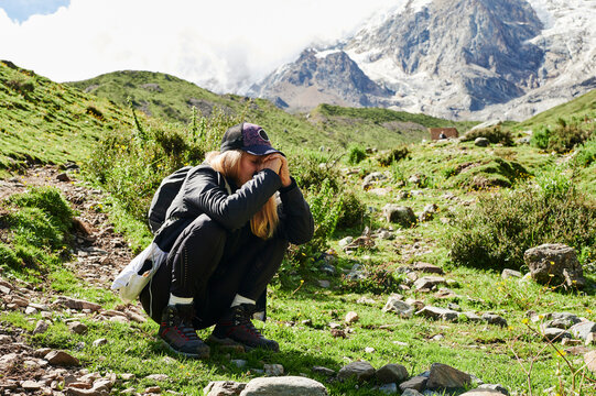 Blonde young woman trekking