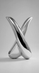 A sleek, polished metallic sculpture in the shape of an intersecting X against a neutral backdrop