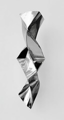 Sculptural silver foil zigzag shape, abstract with sharp angles, against white background
