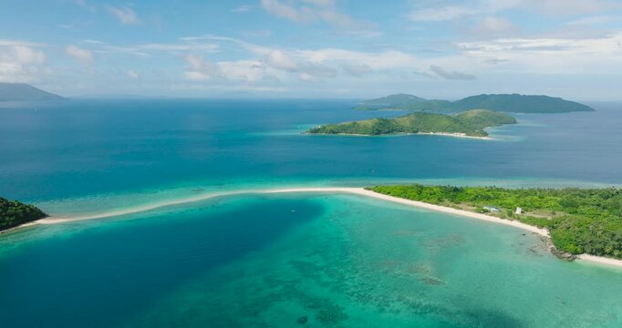 Bon Bon Beach with white sand and sandbar, turquoise clear water. Romblon Island. Romblon, Philippines.