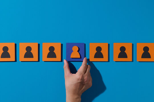 Hand Selecting Unique Individual Among Uniform Group