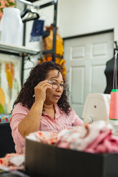 Dressmaker working in her atelier