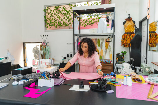 Seamstress working in a sewing workshop