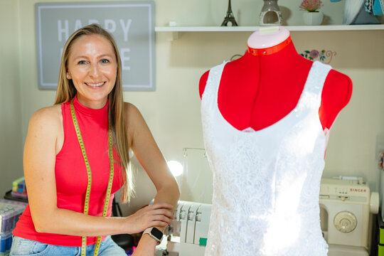 Smiling fashion designer