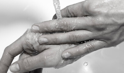 Fototapeta premium Wash woman hand. Water. Background. Finger. Hand