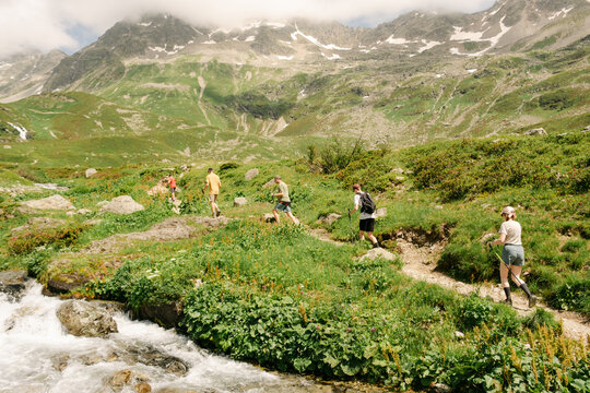 group of people hiking in the Alps,  France
