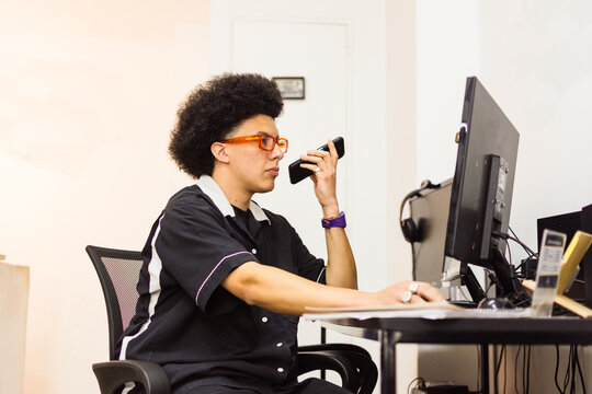 Small business owner asking vendor for supplies in the back office