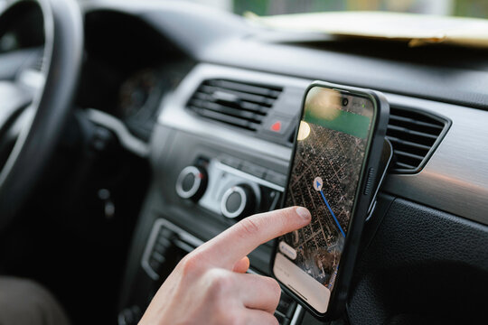 A man uses a navigator on a mobile phone