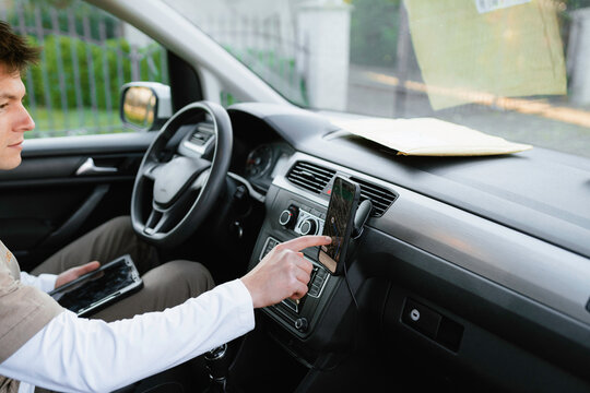 A man uses a navigator on a mobile phone