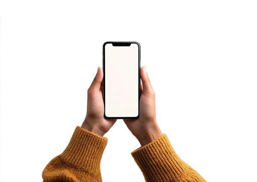 Hands holding a smartphone with blank screen against a white background, wearing yellow sweater
