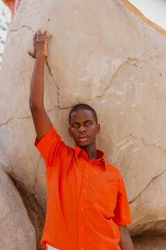 Young man with his arm extended