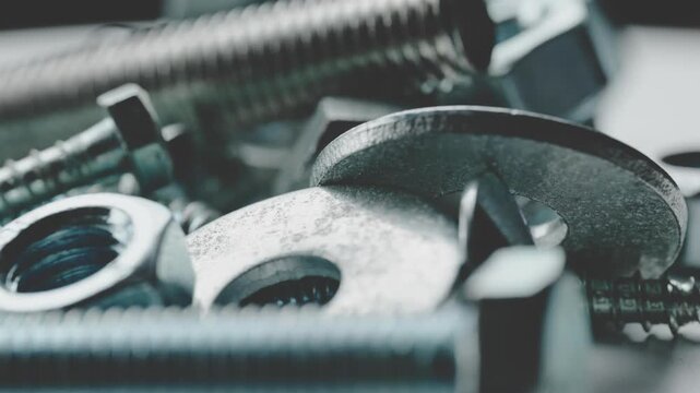 Macro Pile of Steel Bolts Nuts and Washers