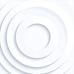 A white circular layered design with a central hollow circle