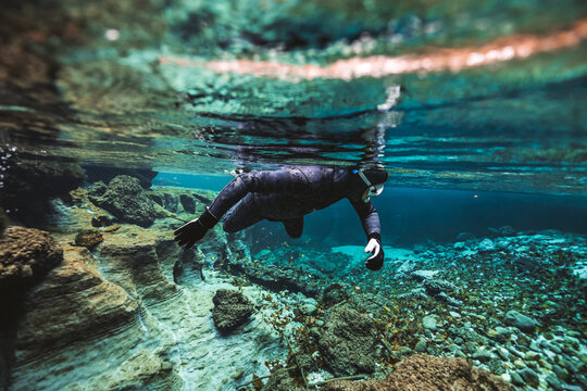 diver in clear river