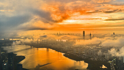 Chicago Skyline Golden Sunset with Dramatic Sky and Misty Evening © PhamHong