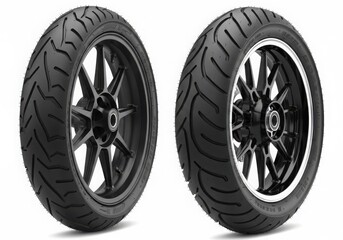 Obraz premium Pair of black motorcycle tires with intricate wheel designs against a white background