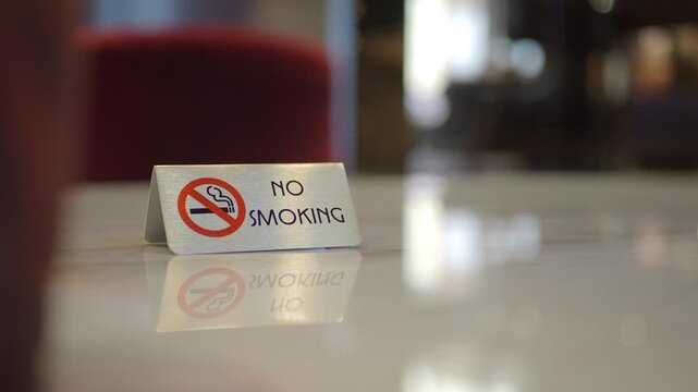 Sign shows no smoking rule in restaurant area