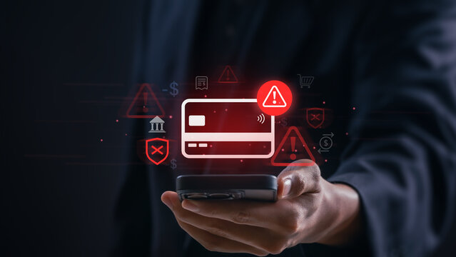 Online payment fraud detection and cybersecurity threat alert concept person using smartphone, blocked credit card transaction warning and digital banking security system to prevent financial scam.